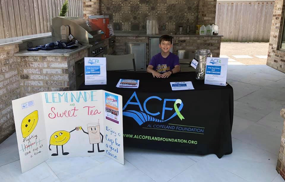 Josh Bertuglia mans his lemonade stand